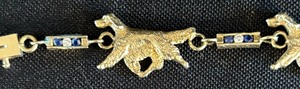 lot 423 image: 14k Gold Dog Figurine Charm Style Bracelet