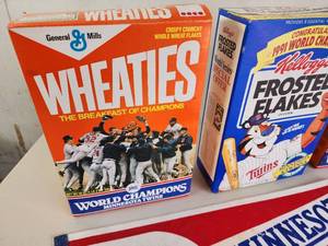 lot 448 image: (2) 1987 Minnesota Twins World Series Champions Wheaties Boxes & (1) 1991 Minnesota Twins World Series Champions Frosted Flakes Box with Pennant