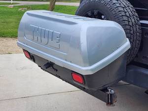 lot 437 image: Thule Receiver Hitch Swing Out Enclosed Cargo Carrier