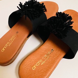 lot 173 image: Lovely Dressy Black Tassels with Camel Sole Sandals by Andre Assous