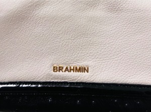 lot 151 image: Brahim Leather Black and White Ostrich Embossed Baguette Clutch