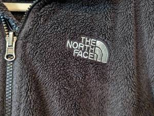 lot 107 image: North Face Black Fuzzy Zip Up