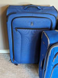 lot 114 image: Three Large Suitcases