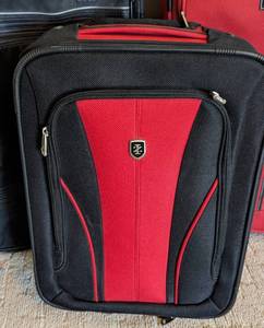 lot 115 image: Three Small Carry On Suitcases