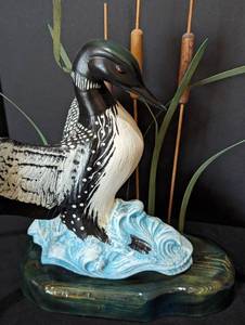 lot 120 image: Two Decorative Loon Figurines