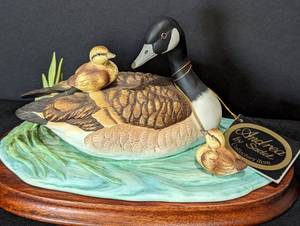 lot 123 image: Two Duck Figurines