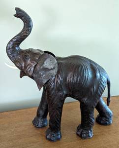 lot 58 image: Paper Mache and Leather Zebra and Elephant Sculptures