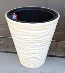 lot 136 image: Set of Three Cream Plastic Outdoor Planters