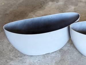 lot 140 image: Four Grey Oval Plastic Planters