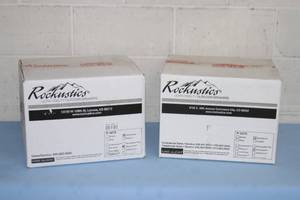 lot 16 image: PAIR - New in Box Rockustics Rocquette Sandstone Color Rock-Shaped Outdoor Patio  Landscaping Pro Audio Speakers