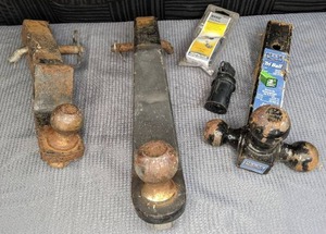 lot 128 image: (3) Ball Hitches Valley 1 78, Reese Tri-Ball (1 78, 2, 2 516), and Other, Hoppy Trailer Connector, Hopkins 6 Pole Round Connector