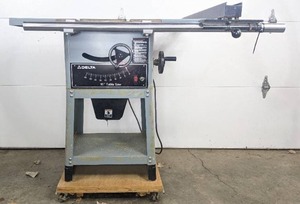 lot 20A image: Delta 10 Table Saw and Tote with Table Saw Miters, Freud Safety Dado in Case, and Other Accessories