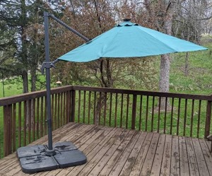 lot 33 image: Patio Umbrella with Sand Filled Weighted Base