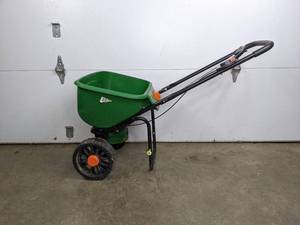 lot 121 image: Scotts Turf Builder Edge Guard Broadcast Spreader DLX
