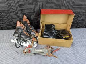 lot 138 image: Antique Metal Ice Skates, Black and Brown Ice Skates and Black Size 4 Ice Skates
