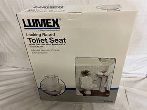 lot 89 image: Lumex Locked Raised Toilet Seat with Removeable Armrests
