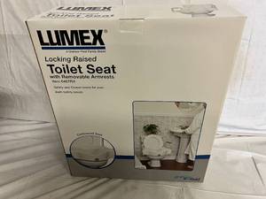 lot 91 image: Lumex Locked Raised Toilet Seat with Removeable Armrests