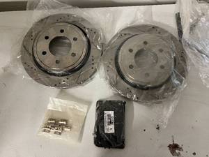 lot 202 image: 2 Slotted Disc Brake Rotors and Brake Pads