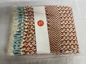 lot 290 image: Burnt Sienna, White, and Teal Knitted Throw Blanket