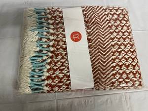 lot 292 image: Burnt Sienna, White, and Teal Knitted Throw Blanket