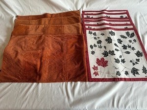 Two Sets of Placemats - 4 Rust and 5 Leave Patterned Square Placemats
