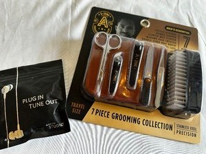 New 7 Piece Stainless Steel Travel Grooming Kit and Headphones