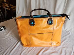 Urban Junket PurseBag in Yellow with Teal Lining Made of 100% Recyclable Materials. Measuring 14 x 4 x 11