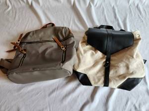 Two Medium Sized Canvas and Cloth Backpack Style Purses