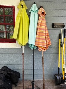 Three Patio Umbrellas and One Metal Base