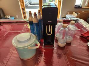 Soda Stream, Two Plastic Bottles, Three Used CO Cartridges (That can be turned in for credit) and Ice Bucket