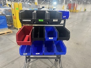 lot 38 image: Akro Mills Two-Sided Rolling Bin Cart with 24 Various Sized Bins