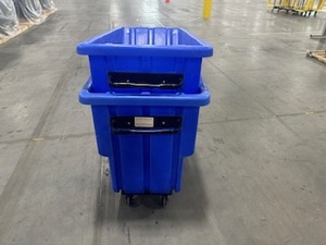 lot 54 image: Pair of Blue Bayhead Tilt Trucks (one missing wheels)