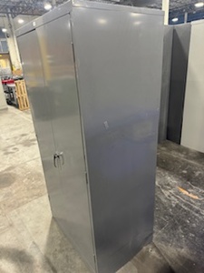 lot 104 image: Two Door Cabinet (no key), Four adjustable height shelves. Dark Gray