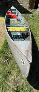 lot 26 image: Aluminum Browning Marine 17 Canoe and 2 Life Jackets