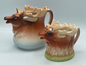 lot 71 image: Pair of Czech Moose Cream Pitchers