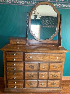 lot 111 image: Solid Oak 9 Drawer Dresser & Mirror