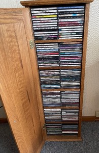 lot 246 image: Oak CD Storage Tower Full wCDs