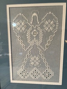lot 211 image: Framed Angel Hardanger with Hardanger table runner and placements