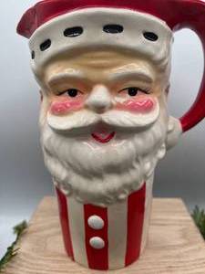 lot 286 image: Vintage Santa Face Pitcher 7.5 tall