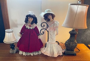 lot 259 image: Two Porcelain Dolls and Two Table Lamps