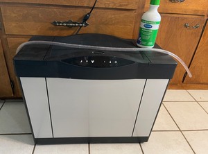 lot 394 image: Air Care Brand Humidifier and Humidifier Treatment Solution
