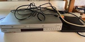 lot 427 image: Sony DVDVCR Player, RCA Antena and Multi Outlet
