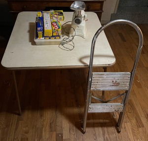 lot 455 image: Card Table, Hamilton Beach Meat Grinder, Storage Bags, Aluminum step ladder