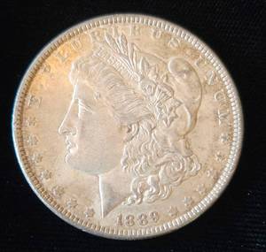lot 1 image: 1889 Morgan Silver Dollar