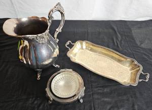 lot 24 image: Silverplate Lot- Rogers Silverplate Bowl, Three Crowns Silverplated Tray 14 and Baroque by Wallace Silverplate Water Pitcher 9.75 H