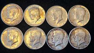 lot 14 image: 8 90% Silver JFK Half Dollars