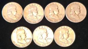 lot 12 image: 7 Benjamin Franklin Silver Half Dollars
