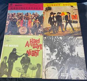 lot 39 image: Unauthorized Releases of the Beatles - 4 Vinyl Records, A Hard Days Night, Sgt Peppebs Loney Hearps Club Band, Revolver The Beatles and Rubber Soul