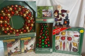lot 47 image: Holiday Decorations, Nativity Set, Stoneware Tree Plates and Santa Figurine