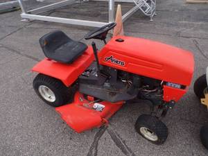 lot 36 image: Ariens Riding Lawnmower for parts or repair
